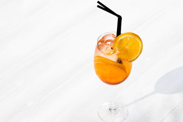 Cocktail aperol spritz on a white background. traditional Italian alkoholic refreshing drink