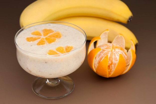 Cocktail of banana with tangerine and yogurt