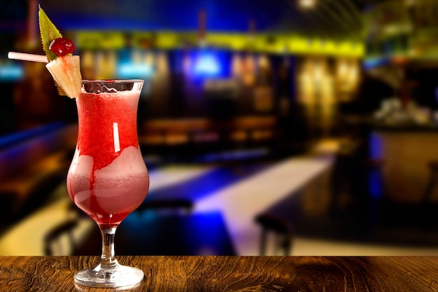 Cocktail on blurry pub