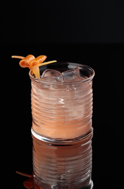 Cocktail in a glass on a black background