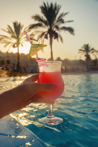 Cocktail in the hands of a woman