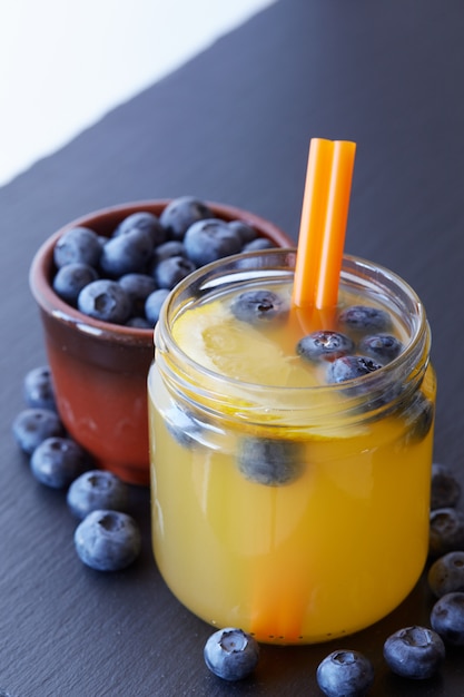 Cocktail of orange and bluberries