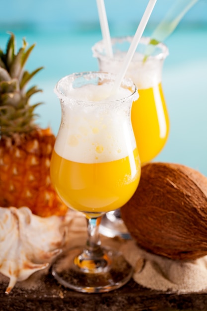 Cocktail of pineapple, rum, liqueur