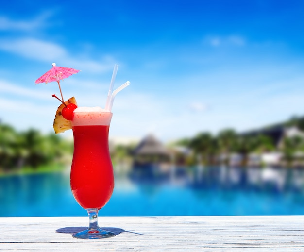 Cocktail with blur beach on background