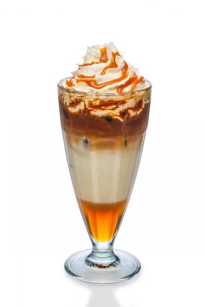 Cocktail with coffee, caramel syrup and whipped cream isolated on white