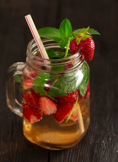 cocktail with fresh fruits berries and mint