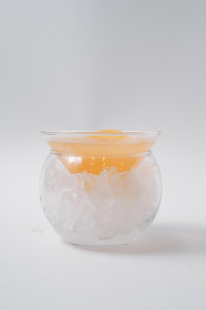 Cocktail with ice crust and orange liqueur