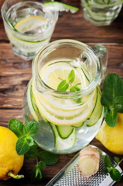 Cocktail with lemon, cucumber and ginger