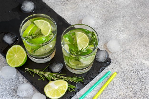 Cocktail with lime and rosemary. 