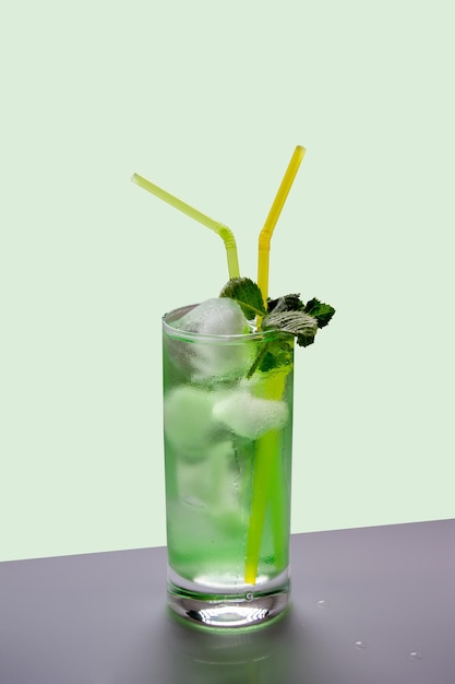 Cocktail with mint and ice in a glass