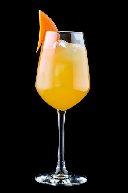 Cocktail with passion fruit and pumpkin On dark background