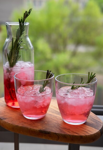 Cocktail With Rosemary And Melting Ice