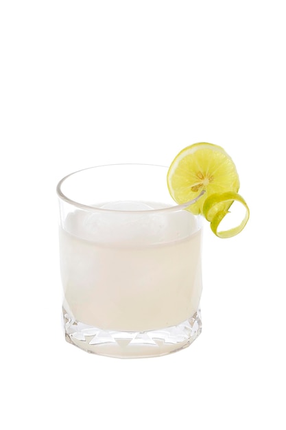 Cocktails and ice spheres round shape in glasses with sliced lemon isolated on white background