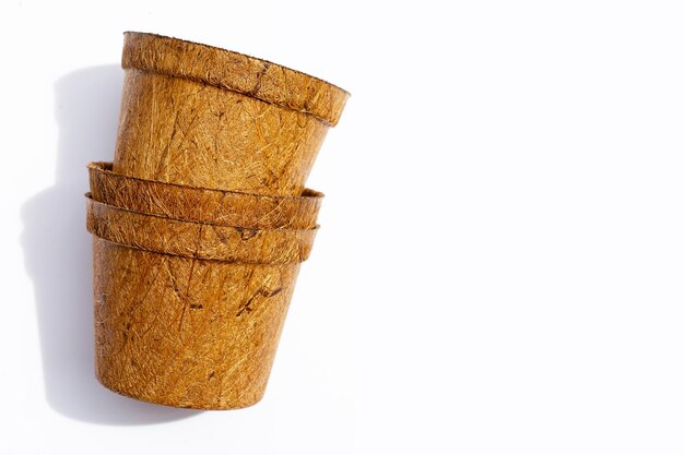 Coco coir pots on white background