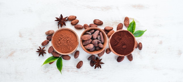 Cocoa beans cocoa powder is dark and light On a white background Top view