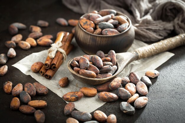 Cocoa beans on an old background.