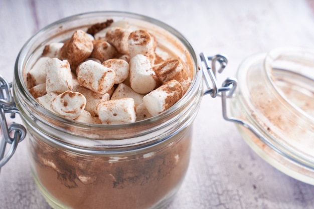 Cocoa in a jar with marshmallows Close up