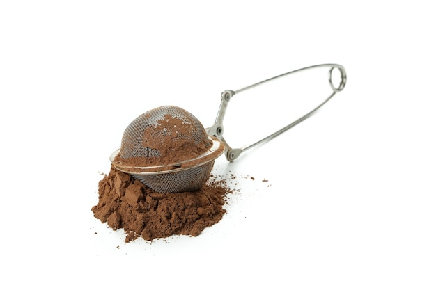 Cocoa powder in sieve isolated on white background