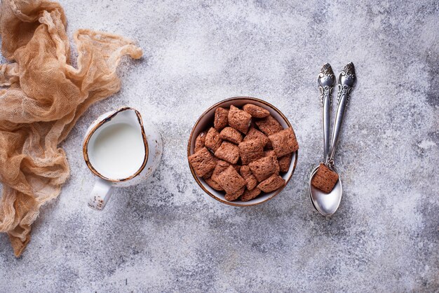 Cocoa puffs corn flakes on light background