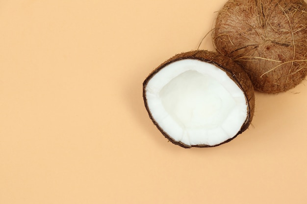 Coconut on beige background