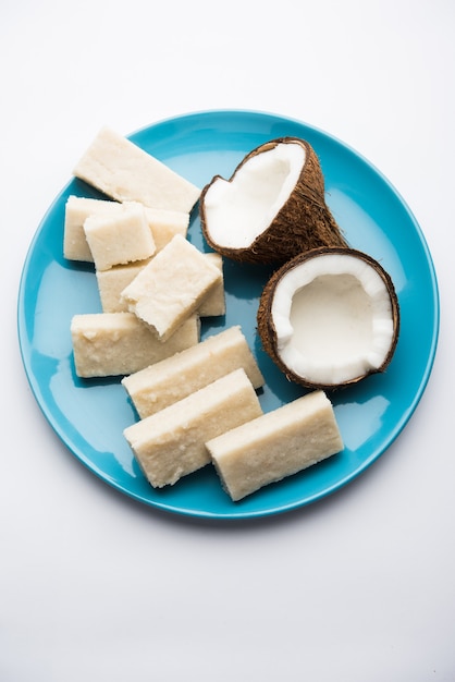 Coconut Burfi or Kopra Barfi Pak or Fresh Nariyal Fudge, selective focus