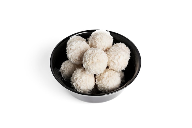 Coconut candies with nuts isolated on a white background Raffaello High quality photo