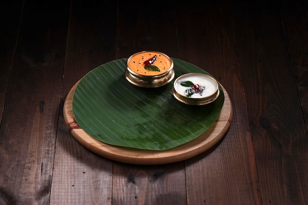 Coconut chutney,south Indian main curry for breakfast items which is seasoned with mustard , dry chilly and curry leaves.