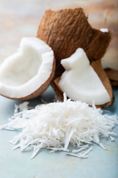 Coconut flakes on a blue background.