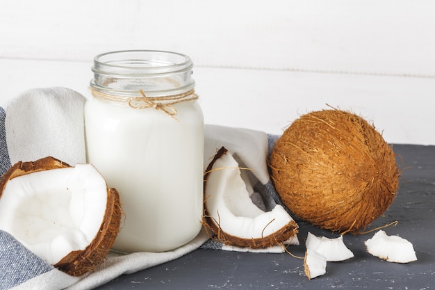 Coconut and  glass of coconut milk