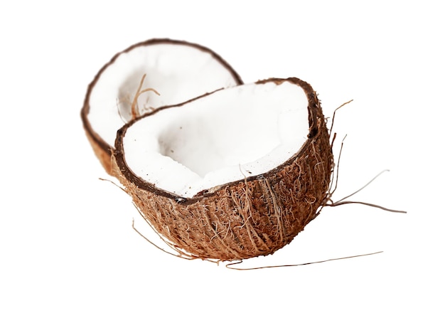 Coconut halves Cut pieces crosssection of open coco nut fruit isolated on white background