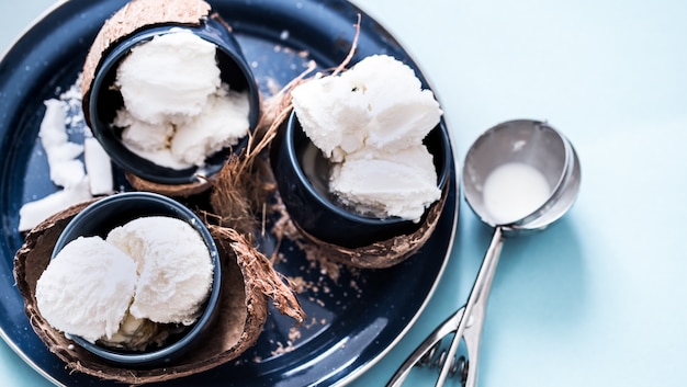 coconut ice cream on a blue table