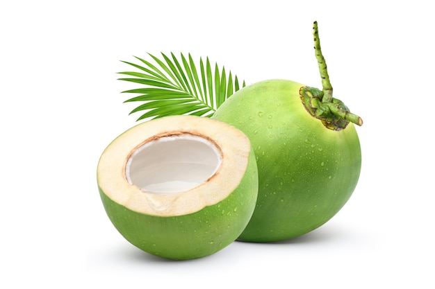 Photo coconut juice in half fruit isolated on white background.