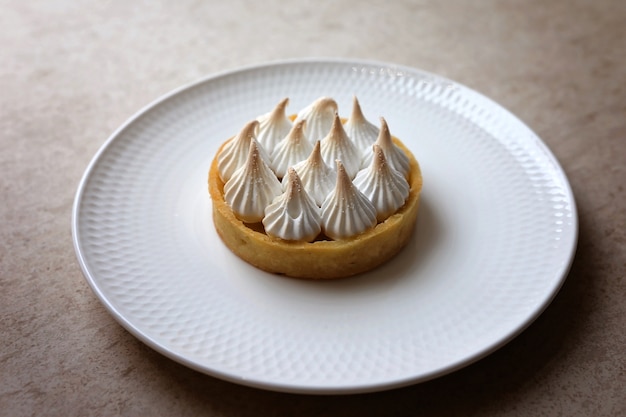 Photo coconut and lemon meringue tart