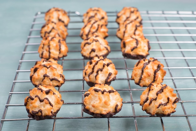 Coconut macaroons on a textured blue background