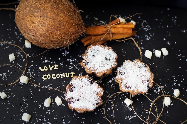 Coconut muffins on a black background