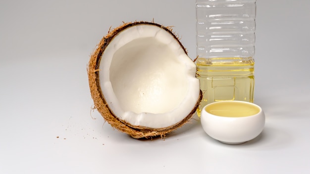 Coconut oil with a half of a coconut