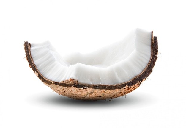 Coconut pieces isolated on white surface