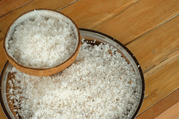 coconut powder on wood background