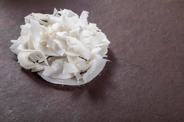 Coconut shavings on top of stone