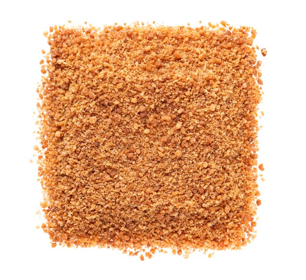 Coconut sugar isolated on white background brown unrefined coconut palm sugar top view