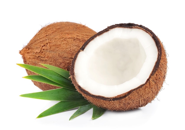 Coconut with leaves on a white 