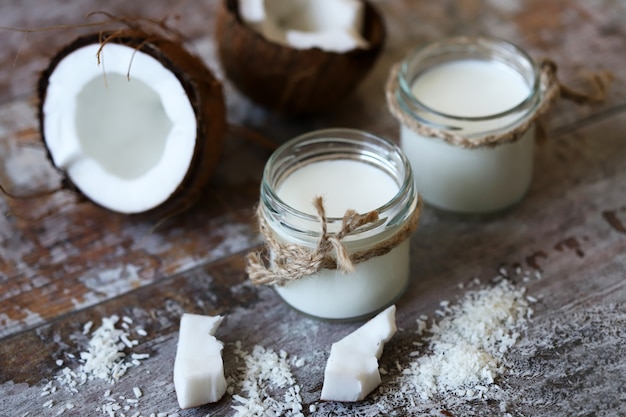 Coconut Yogurt Vegan food. Coconut and coconut flakes. 