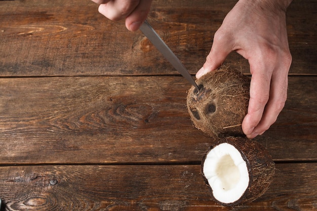 Coconuts in process of opening