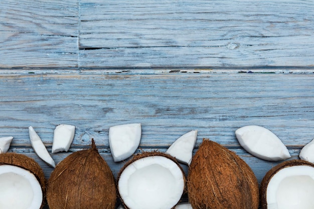 Coconuts on a rustic wooden background