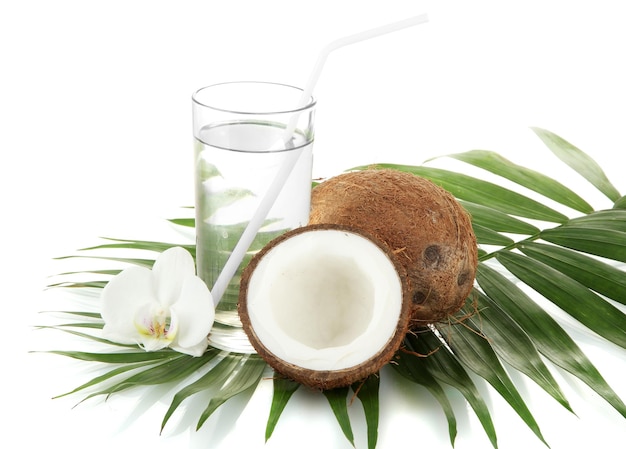 coconuts with glass of milk isolated on white