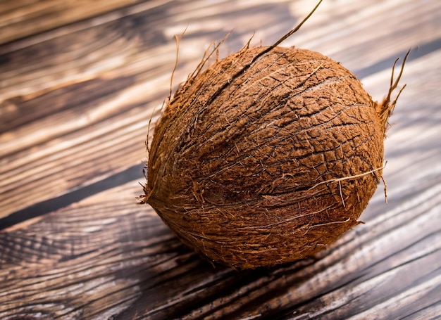 Coconuts on a wooden table