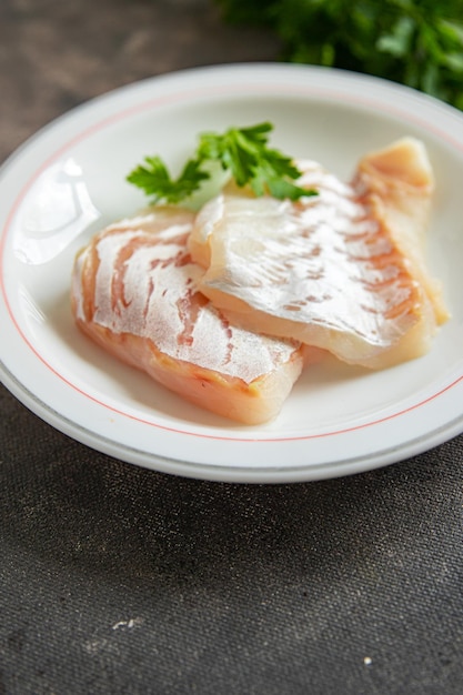 タラ魚白い皮なしフィレ新鮮な食事食品スナックテーブルコピースペース食品背景素朴な