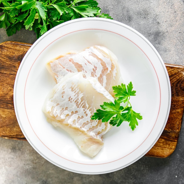 cod fish white skinless fillet fresh meal food snack on the table copy space food background rustic