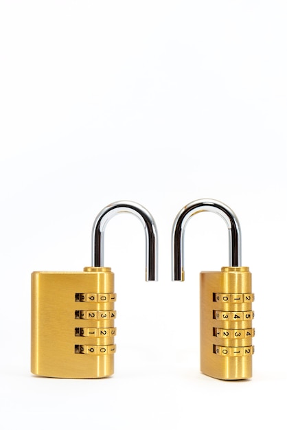 Photo code lock. close-up of a combination lock with chrome numbers on a white background. security concept.