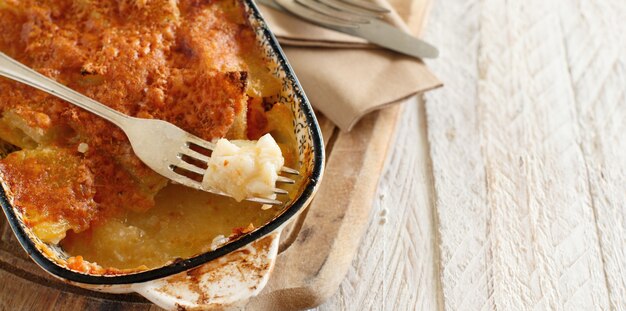 Codfish with potatoes cooked in the oven